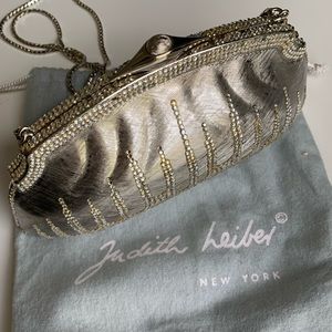 Silver Judith Leiber bag with rhinestone embellishments